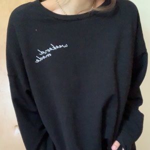 this is a large black sweatshirt.
